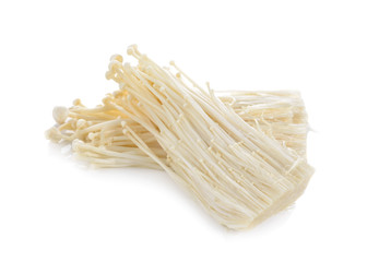 Fresh Enoki mushrooms on white background