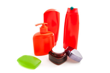 Obraz premium cream and other toiletries on white