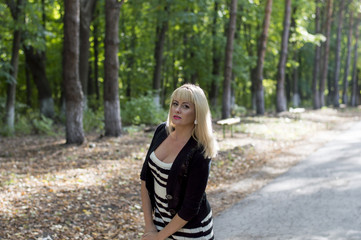 the beautiful blonde on the road in park