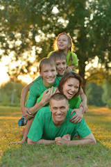 Fototapeta premium Family resting in a summer park