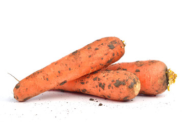 Fresh red carrot on white background.