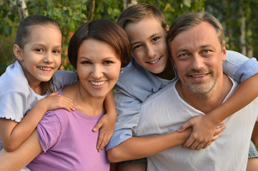 Family resting in  summer park