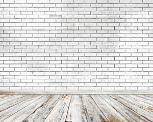 Empty room. White brick wall and wood floor.