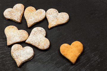 HEART COOKIES OVER SLATE SURFACE