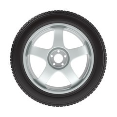 Obraz premium the wheel with a new tire on a white background