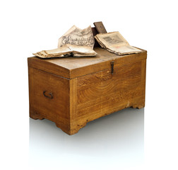 Vintage wooden coffer with books