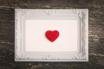 White retro frame with red heart