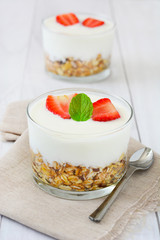 Yogurt with cereals and strawberries
