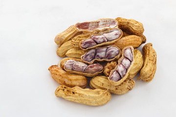 Boiled peanuts on a white background.