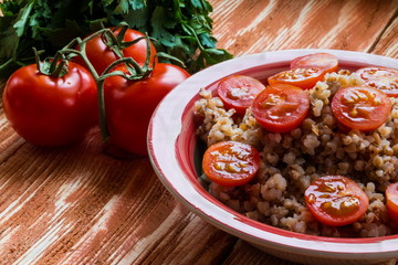 Buckwheat porridge with fresh tomatoes