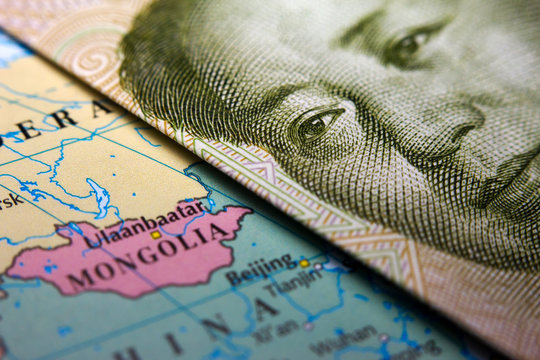 Close-up of a map of Mongolia (incl. Gobi desert) and Mao on a 1 yuan Chinese banknote