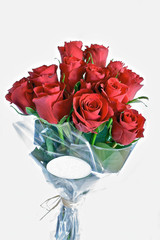 Bunch of red roses with label for text