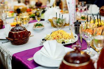 Appetizers and salads at the banquet table