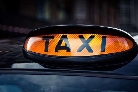 Typical Black Taxi Cab In Central London