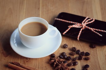 hot coffee with smart phone