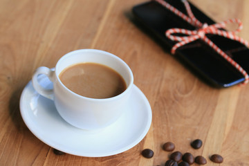 hot coffee with smart phone