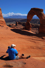 Fototapeta na wymiar People enjoying the beauty of Delicate Arch, Utah, USA