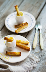 Egg boiled and cooked garlic toast for breakfast.