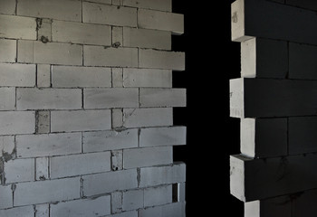 Raw AAC autoclaved aerated concrete wall, angle view, editable background.