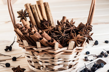Anisetree and cinnamon in a wicker basket