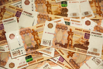 Heap of five thousand russian rubles banknotes
