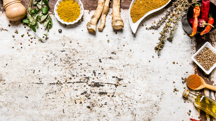 Different spices, herbs and roots view from the top.