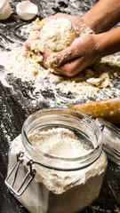 Preparation of the dough . Preparation of the dough the women's hands.