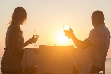 Couple on romantic date in sea restaurant