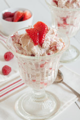 Eton Mess a traditional English dessert made with cream meringue strawberries and raspberries