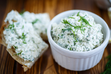 snack salty cheese with herbs