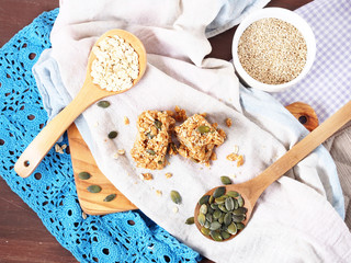 Oatmeal energy bars with oats, pumpkin seeds, peanut butter, agave syrup, sesame and sunflower seeds, top view