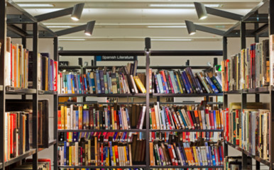 Blurred books in a modern public library
