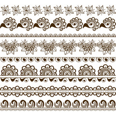 Fototapeta premium Vector set of hand drawn borders in ethnic indian style. Collection of pattern brushes inside