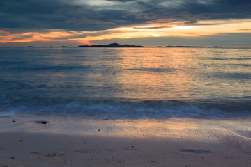 Fototapeta na wymiar Footprint on beach at sunset time