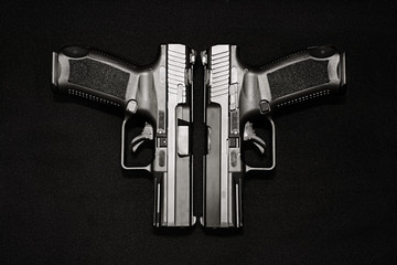 two handgun on the black background