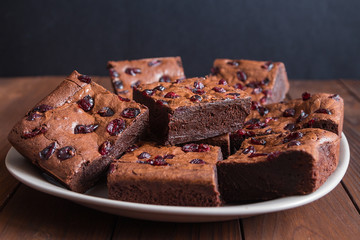 Cake chocolate brownies on dark wooden background