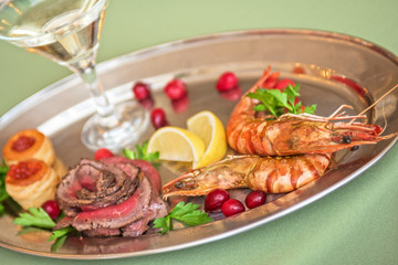 Grilled shrimps and beef meat 