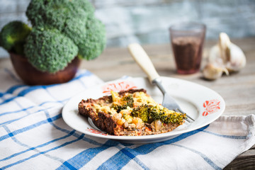 vegan pizza pie with broccoli, mushrooms and chickpeas dough wit