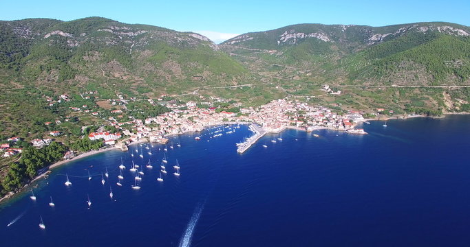 Tourists and boat in bay of Stiniva, Croatia