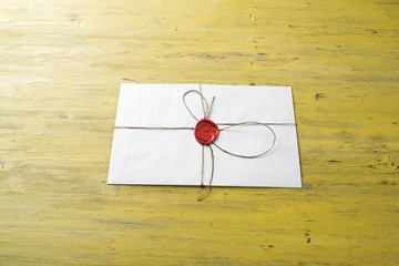 Letter with seal on table