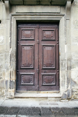 Fototapeta na wymiar Old door in a street