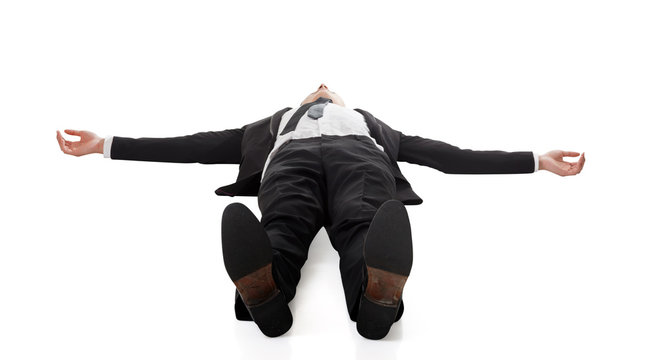 businessman lying on ground