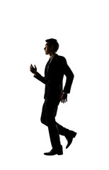 Confident businessman running