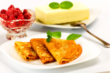Pancakes with strawberries  and briquette butter