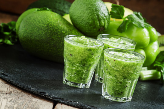 Fresh green detox smoothie made from apples, avocados, greens, l