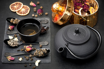 Green tea with jasmine and roses. Asian black tea set