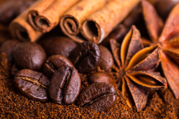 Close-up of coffee beans on pile of roasted coffee. Coffee beans