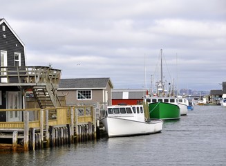Fototapeta na wymiar Fisherman's Cove, active fishing village on the shore of the Atlantic Ocean in Eastern Passage, near Halifax Nova Scotia
