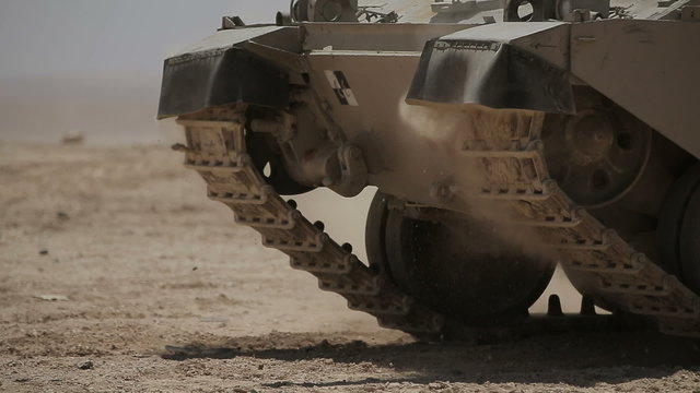 Tank M1 Abrams rides in the desert. 2 shot.
