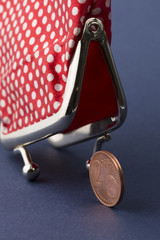 Wallet and last two euro cent blue